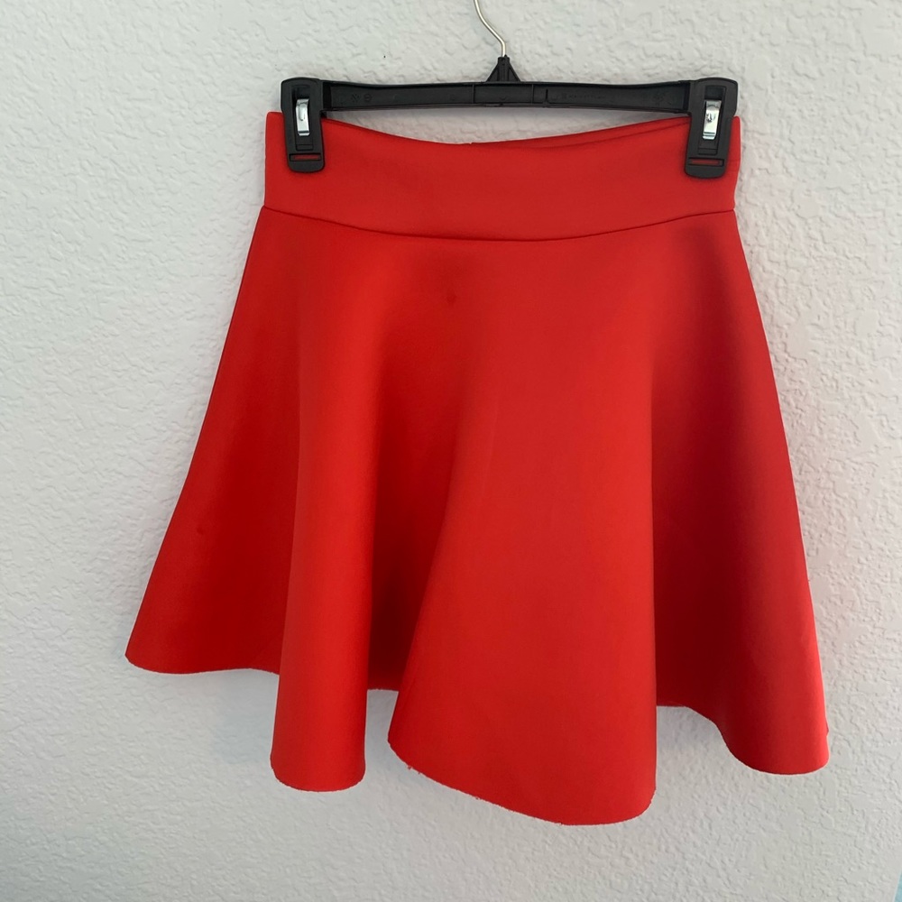 red fingertip length skirt, women’s size small